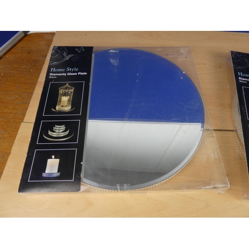 516 - A lot of two Diamante glass plate display stands, in original packaging, each measuring 30cm diamete... 