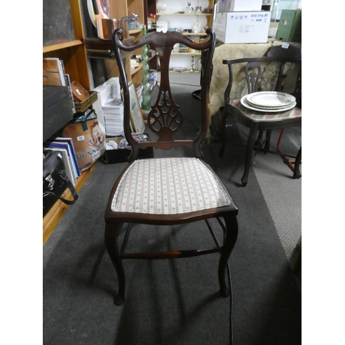 519 - A mahogany framed bedroom chair.