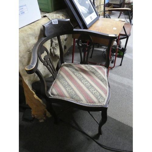 523 - An antique corner chair.