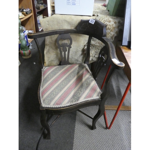 523 - An antique corner chair.