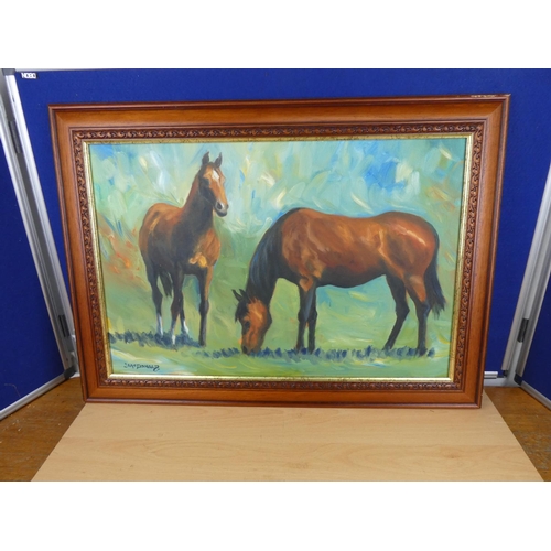 538 - A framed oil painting of horses signed J McDonald.