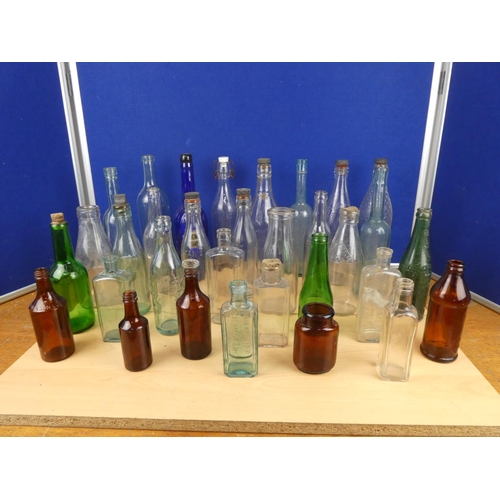 540 - A large lot of vintage glass beer and other bottles.