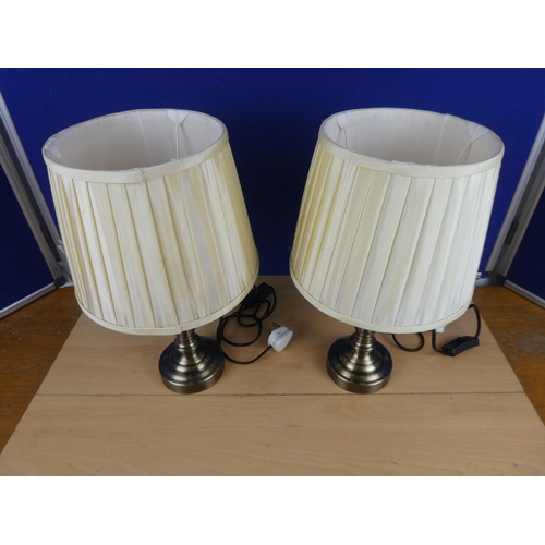 556 - A pair of modern table lamps.