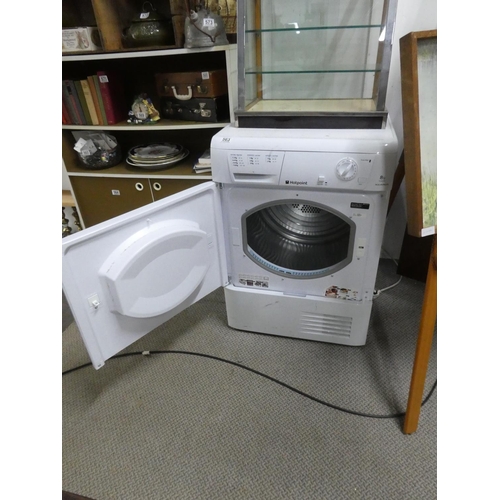 563 - A Hotpoint Aquarius tumble dryer.