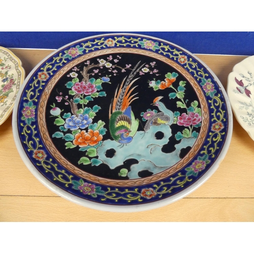 566 - An antique Chines plate and five others.