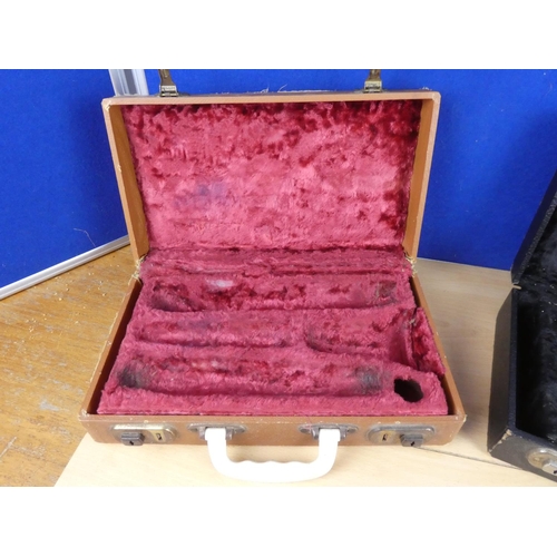 568 - Two vintage clarinet cases.