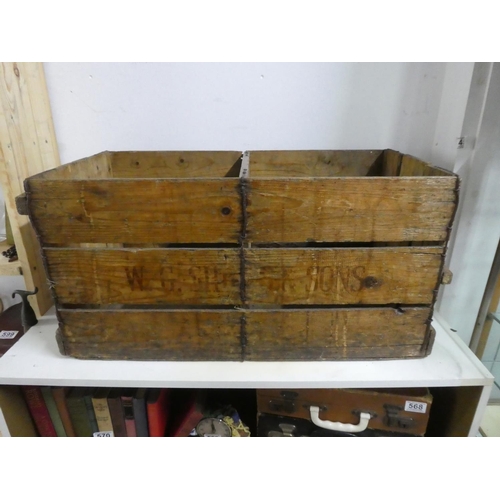 575 - An antique wooden storage crate.