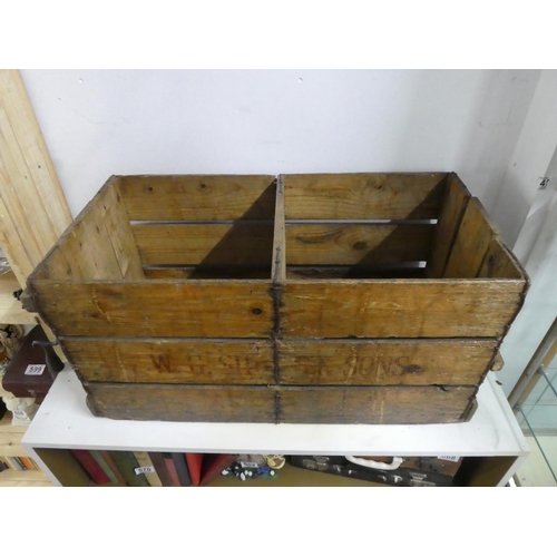 575 - An antique wooden storage crate.