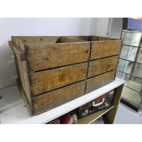 575 - An antique wooden storage crate.