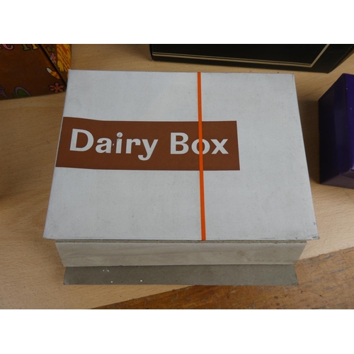 585 - A large lot of vintage cardboard boxes to include Dairy Box, Black Magic and more.