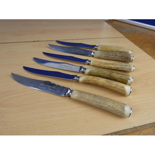 588 - A set of six bone handled knives and forks.