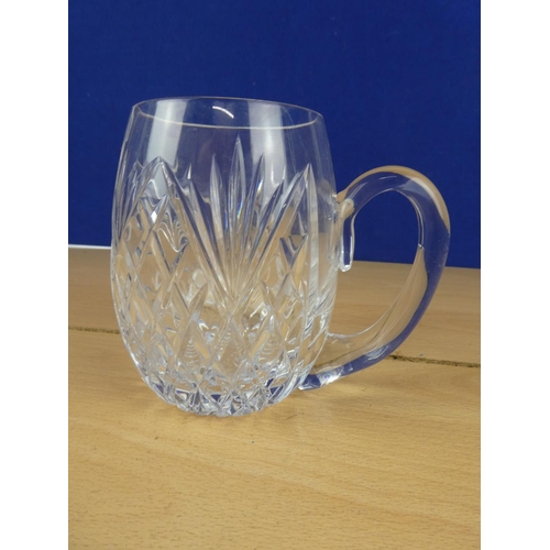 590 - A large crystal glass tankard.