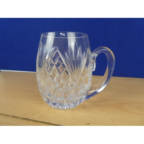 590 - A large crystal glass tankard.