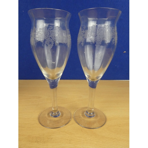 596 - Two etched wine glasses and decanter.