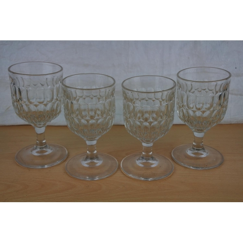 612 - A set of four antique rummer glasses.