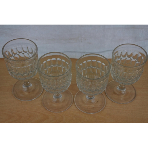 612 - A set of four antique rummer glasses.