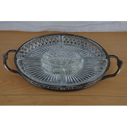 614 - A stunning silver plated serving tray with glass dishes.