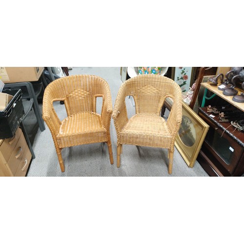 411 - Two vintage wicker chairs.