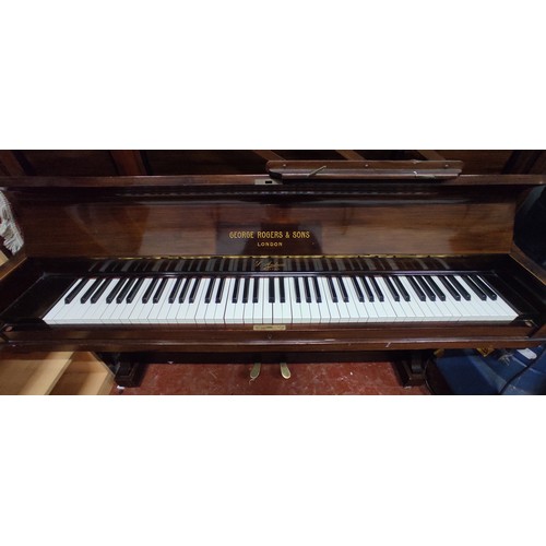 502 - A George Rogers and Sons upright piano made in London.