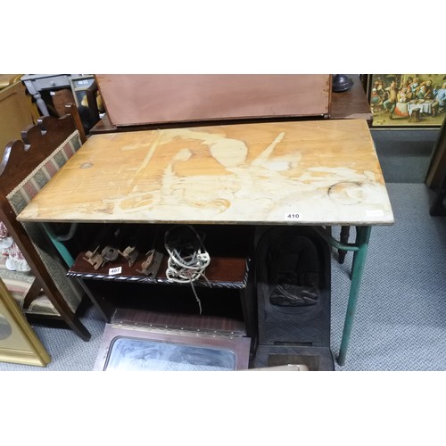 410 - A vintage metal based work table.