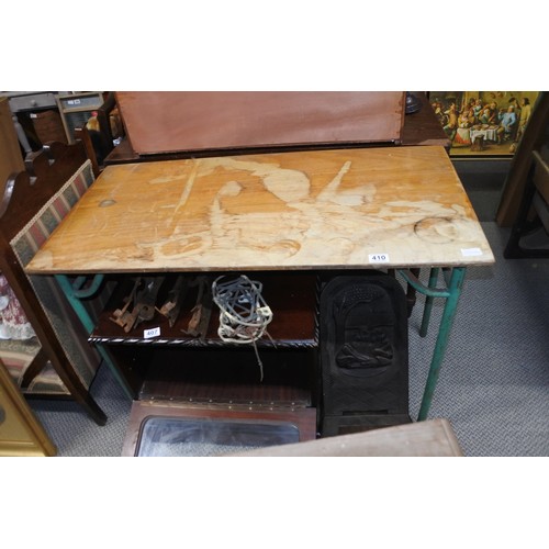 410 - A vintage metal based work table.