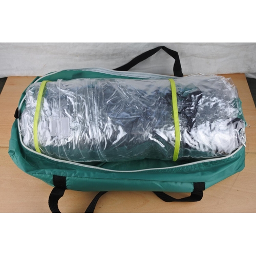 64 - A plastic greenhouse cover, poles and carry bag.