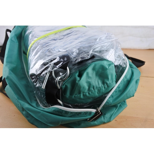 64 - A plastic greenhouse cover, poles and carry bag.