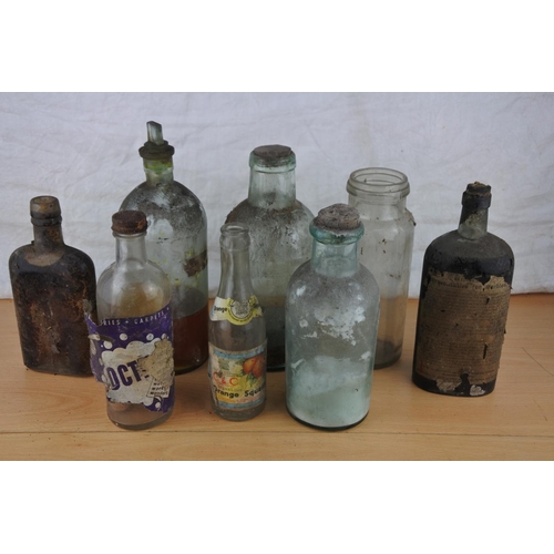 66 - A collection of vintage glass bottles.