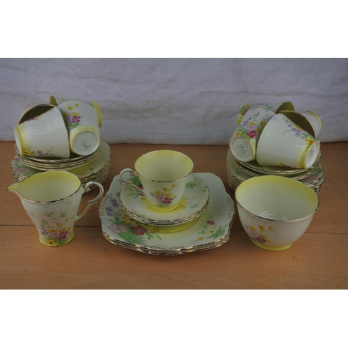 69 - A stunning antique Wellington bone china tea set.