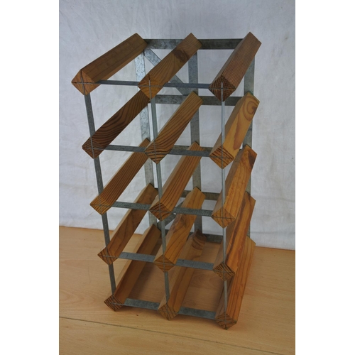 76 - A wood and metal eight bottle wine rack.