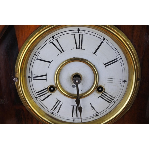 77 - A stunning antique mahogany cased mantle clock. Approx 45cm.