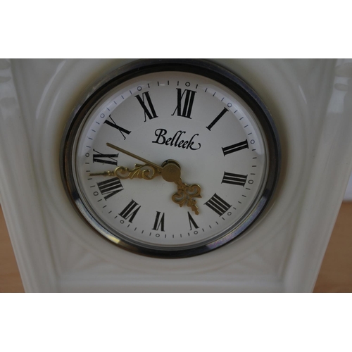 80 - A Belleek pottery mantle clock.