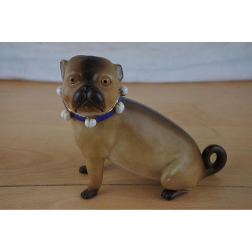 82 - An antique ceramic pug dog figure.