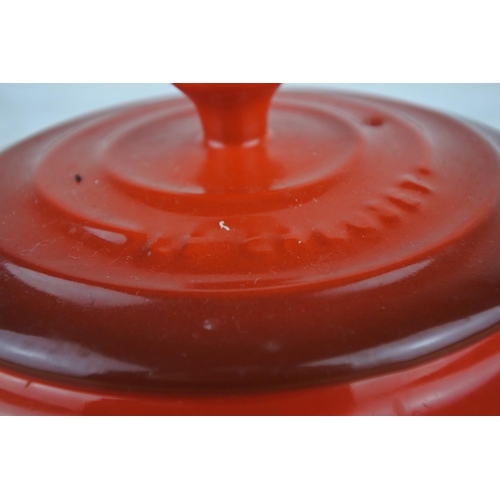 88 - A Le Creuset red teapot.