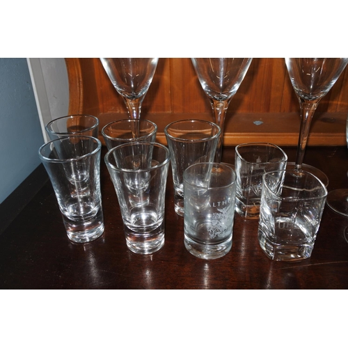 89 - A large assortment of glassware.