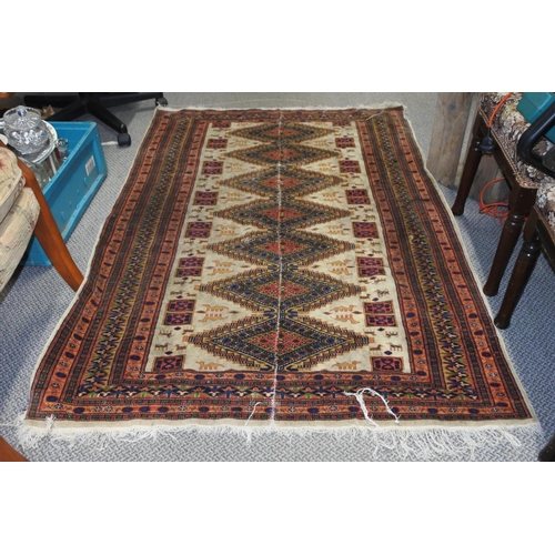 93 - A decorative floor rug with camel detail. Approx 119x178cm.