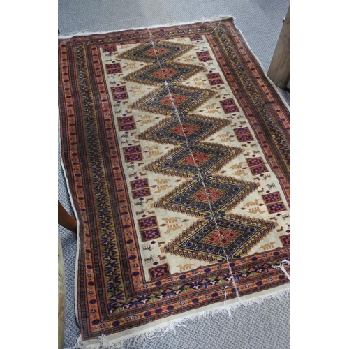 93 - A decorative floor rug with camel detail. Approx 119x178cm.