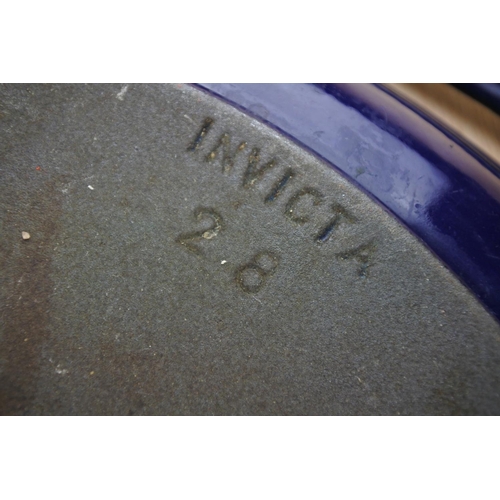 99 - An Invicta 28 cast iron frying pan.