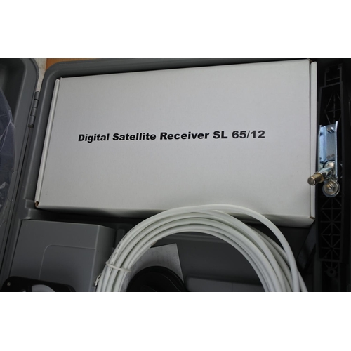 102 - A cased Digital Satellite Receiver and accessories.