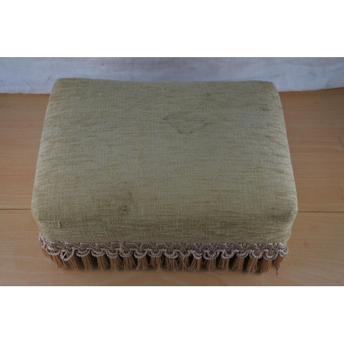 104 - A small upholstered footstool.