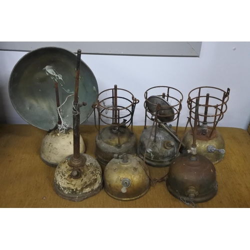 112 - A large lot of vintage tilley and radiator lamps in need of restoration.