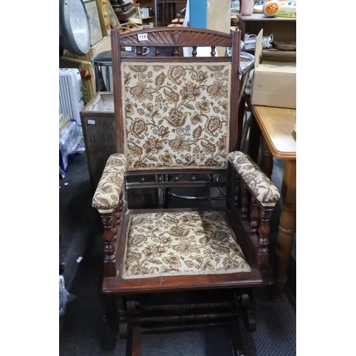 114 - An antique rocking chair in need of restoration.