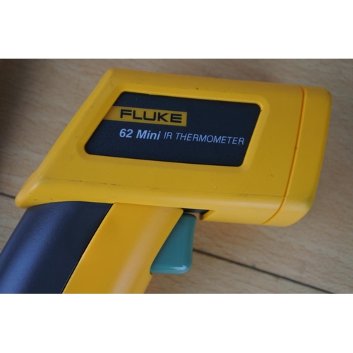 121 - A cased Fluke 62 mini IR thermometer.