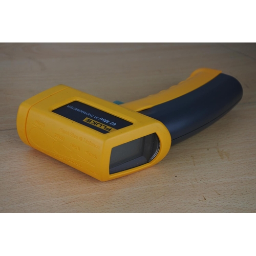 121 - A cased Fluke 62 mini IR thermometer.