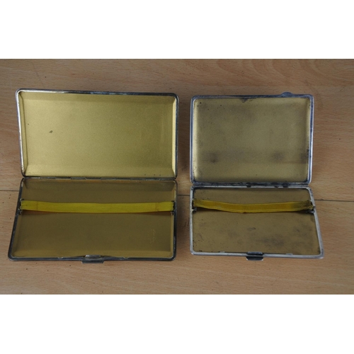 559 - Two vintage EPNS cigarette cases.