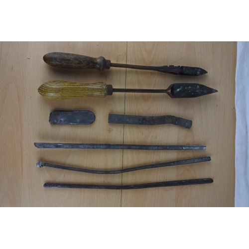 561 - Two antique tools and a lot of solder.