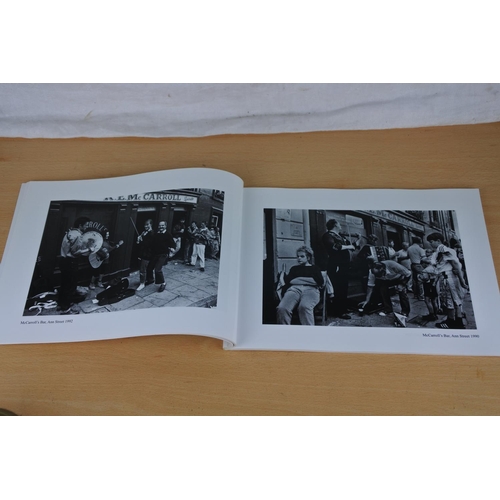 593 - A signed copy of The Auld Lammas Fair Photographs by Alastair McCook.