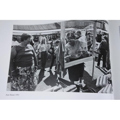 593 - A signed copy of The Auld Lammas Fair Photographs by Alastair McCook.