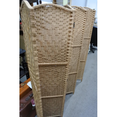 599 - A six fold rattan screen. Each panel approx 40x170cm.