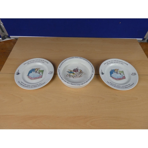 609 - A Wedgwood pottery Peter Rabbit bowl and two other plates.